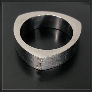 Size 6.5 (approximately) Silver Ring Titanium tri point